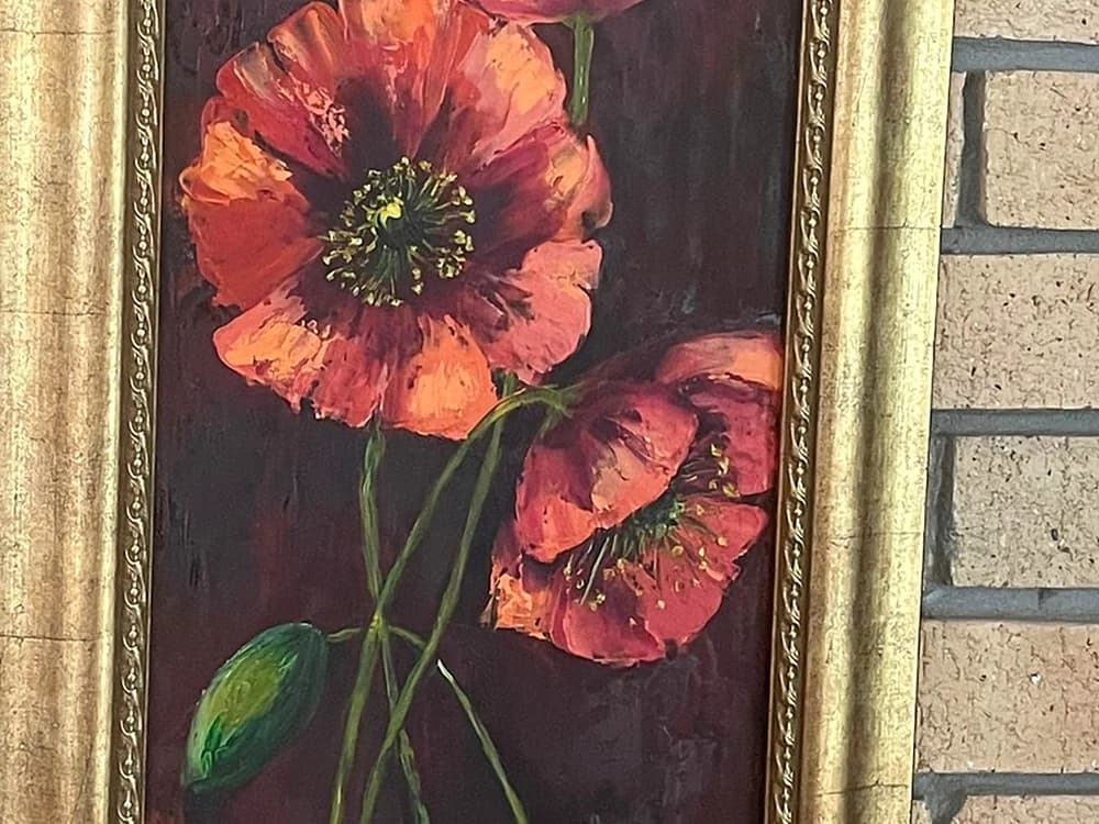 Vertical painting of three red poppies with buds against a dark burgundy background
