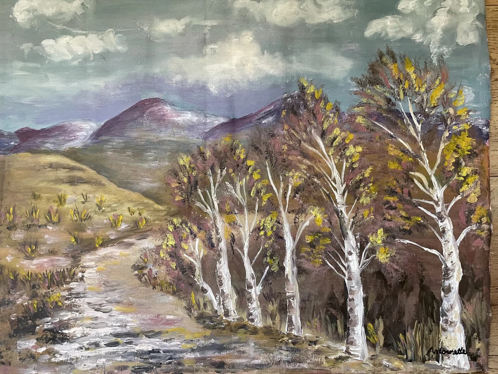 Autumn landscape painting with golden poplar trees lining a stream, purple mountains in background