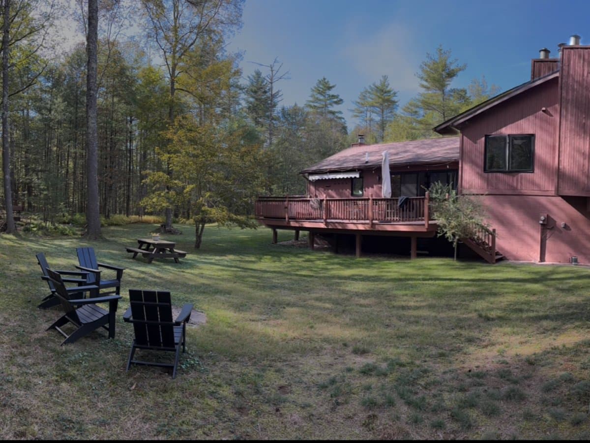 Reference photograph of a cabin in upstate New York woods