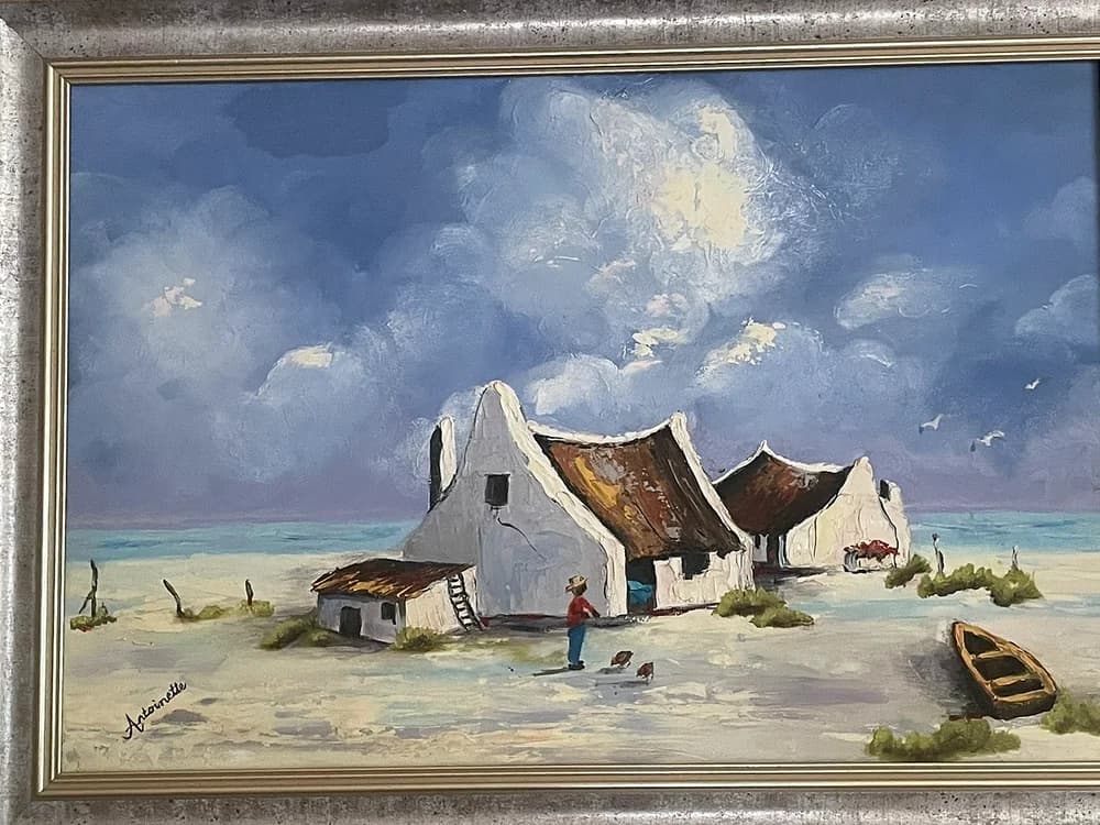 Painting of white fishermen's cottages with rusted roofs, chickens, and a wooden boat under dramatic clouds